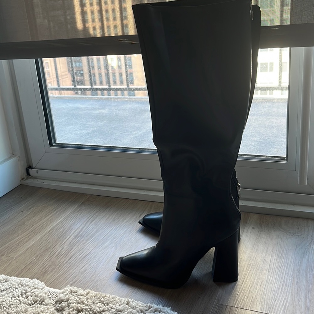 Never worn faux leather boots